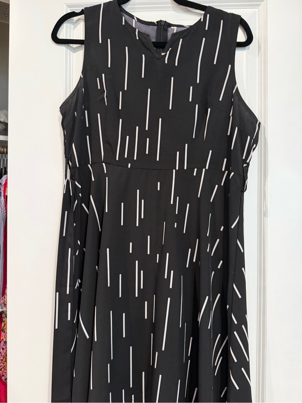 Black Sleeveless A-Line Dress with White Linear Print with belt tie